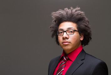 Confident young teenager with afro