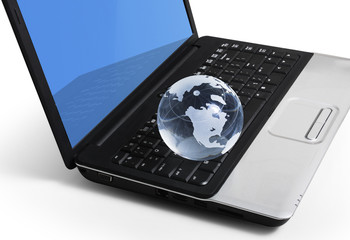 globe on a laptop keyboard