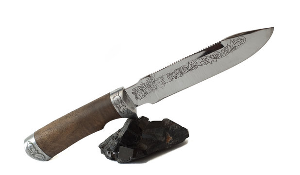 Knife and Tourmaline cristall