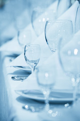 Wineglasses in a row with napkins