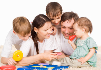 Obraz premium family of a five on carpet