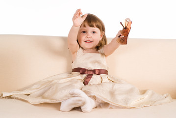 Fototapeta premium little girl on sofa