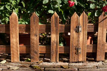 wooden fence at garden under sunshine