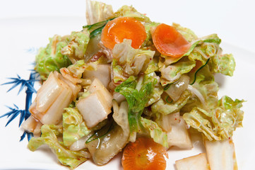 Salad with an octopus on plate
