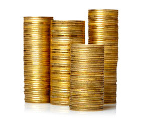 Golden coin stacks isolated over white