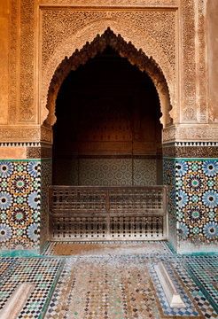 Detail of an ornate stone alcove inside a mosque