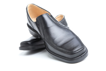 Pair of black man's shoes isolated