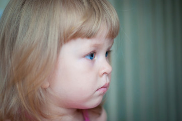 Close-up portrait of a cute little girl