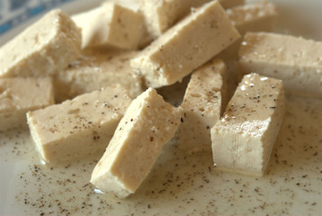 tofu with oil, lemon and pepper
