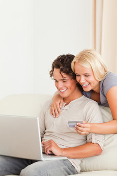 Portrait of a couple shopping online