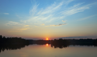 Fototapeta na wymiar lake on a sunset