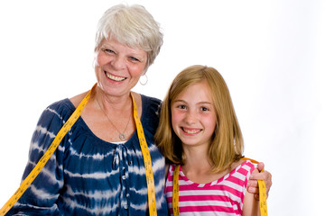 Happy family Grandma with child and measuring tape