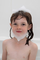 Little Girl playing And Washing In bath