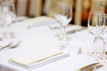 Empty place card on table set for a party