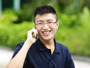 Young man talking on mobile phone