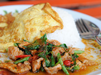 Curry paste with rice and omelet