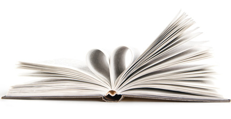 pages of a book curved into a heart shape