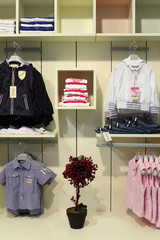 children clothing store, clothing on shelves