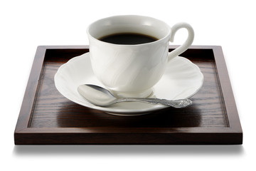 Coffee cup on wooden tray