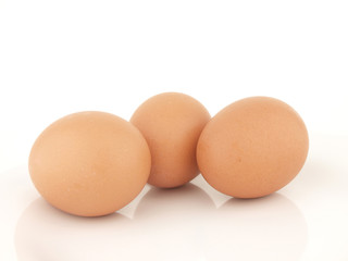 Three brown eggs