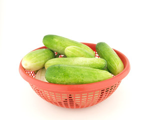 cucumber on red basket