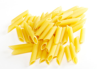 dried italian pasta on white background
