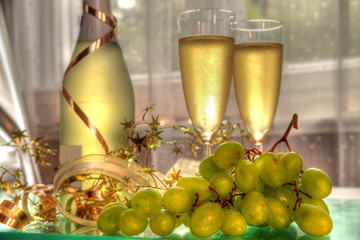 Close-up of grapes and champagne