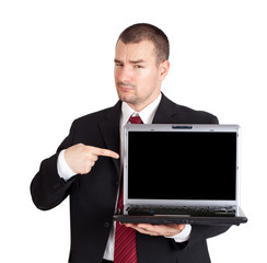 Businessman pointing on laptop