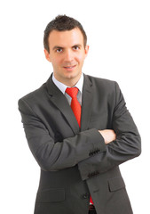 Caucasian businessman with crossed arms.