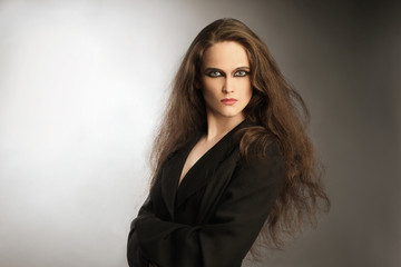 Fototapeta premium Fashion portrait of beautiful woman with long thick hair
