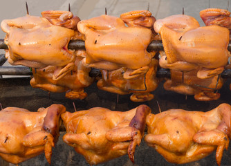 Rotating chicken barbeque.