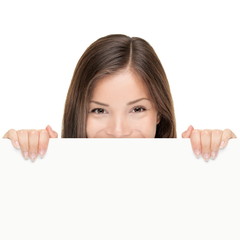 Billboard woman looking over sign