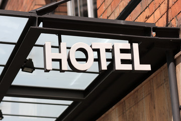 metallic hotel sign