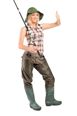 Portrait of a smiling fisherwoman with thumb up