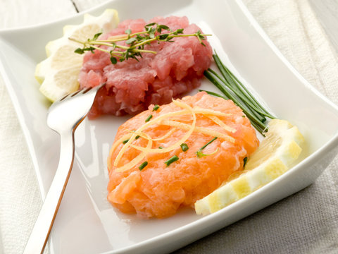 salmon and tuna tartare with lemon and chive