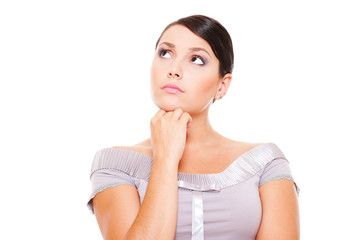 thoughtful woman looking up