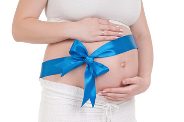 Pregnant belly with blue ribbon