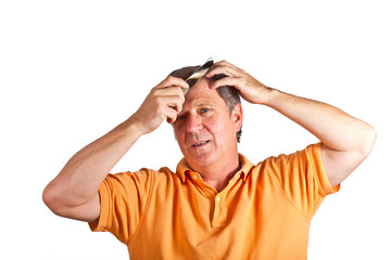 attractive man combing his hair