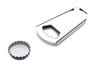 close up of bottle opener and cap on white background with clipp