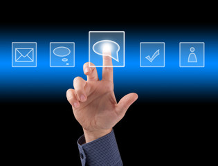 hand pushing a button on a touch screen interface
