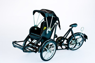 Becak, rickshaw, pedicab isolated on white background
