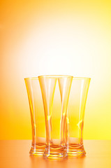 Wine glasses against gradient background
