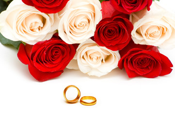 Wedding concept with roses and rings