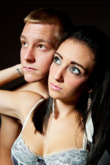 Young couple low key portrait