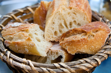 bread in basket - little roll breads in basket on table