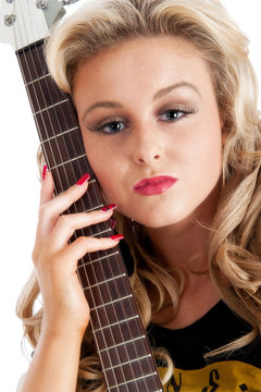Pretty blonde female with guitar