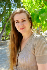 Beautiful mature woman on the farm