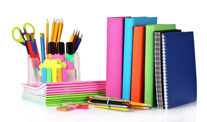 Fototapeta premium bright stationery and books isolated on white