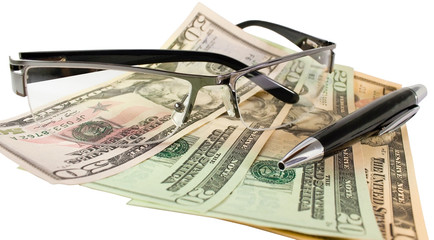 Money, pen, glasses on white background