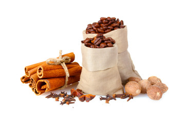 cinnamon, coffee and nutmeg isolated on white